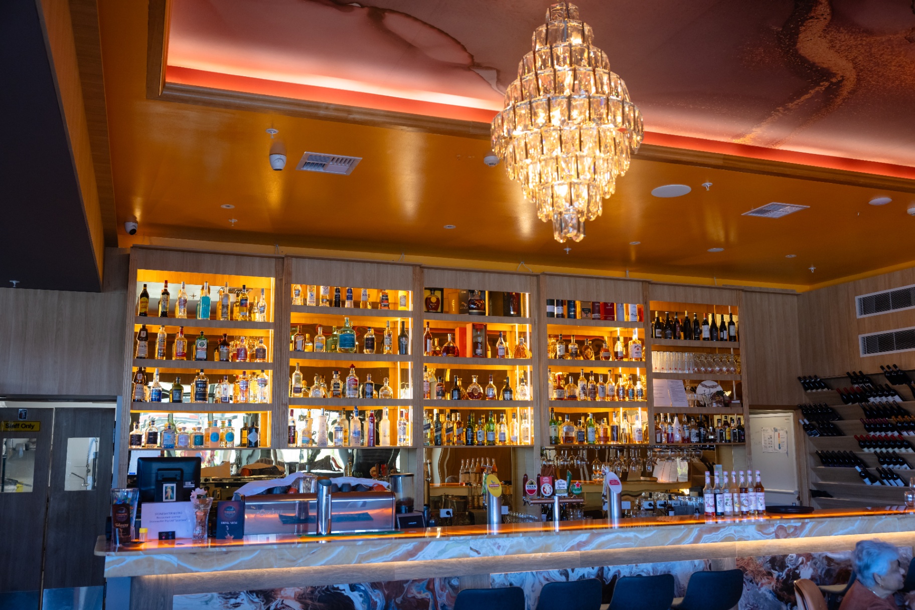 Main bar with crystal chandelier