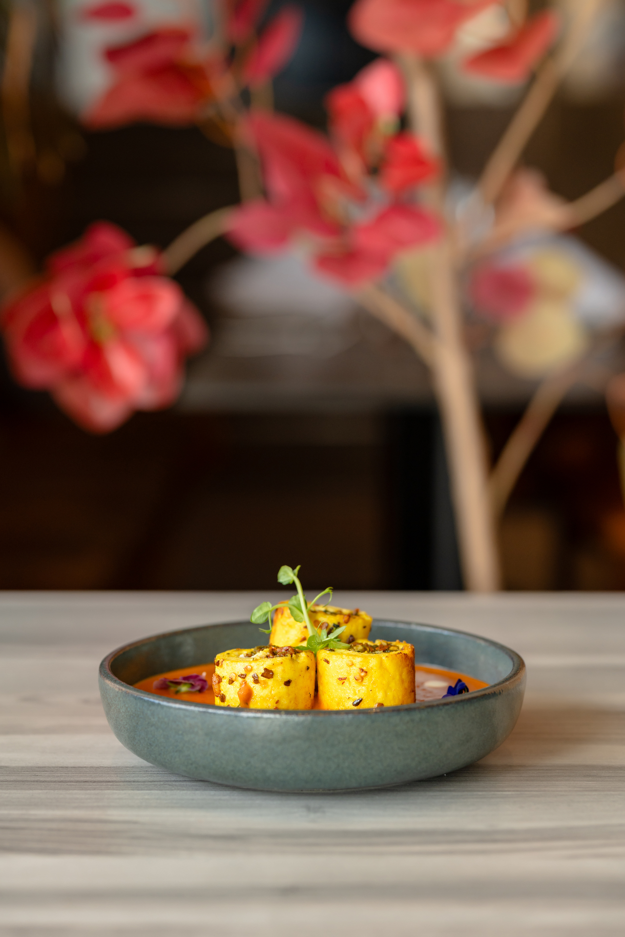 Paneer rolls in tomato curry