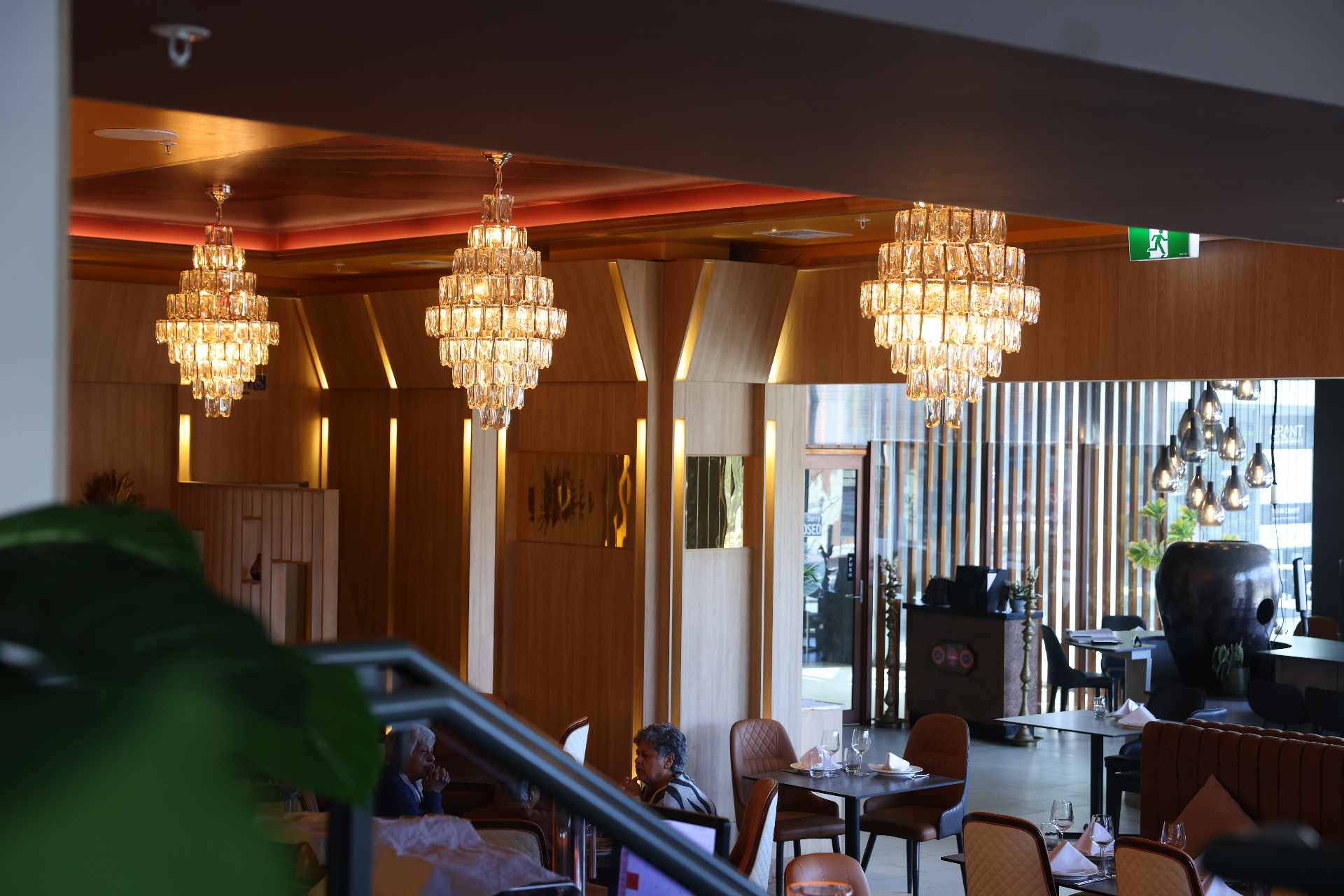 Stonewater dining room with triple crystal chandeliers