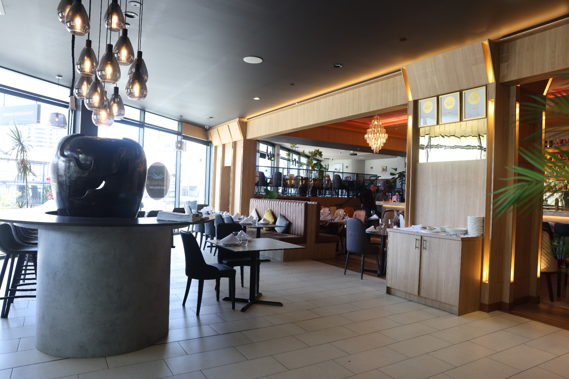 Lobby with pendant cluster and signage