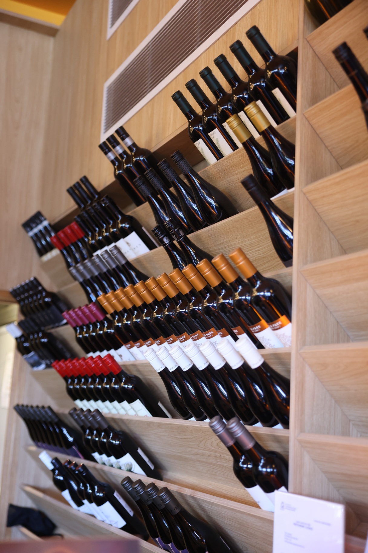 Curated wine rack with rows of bottles