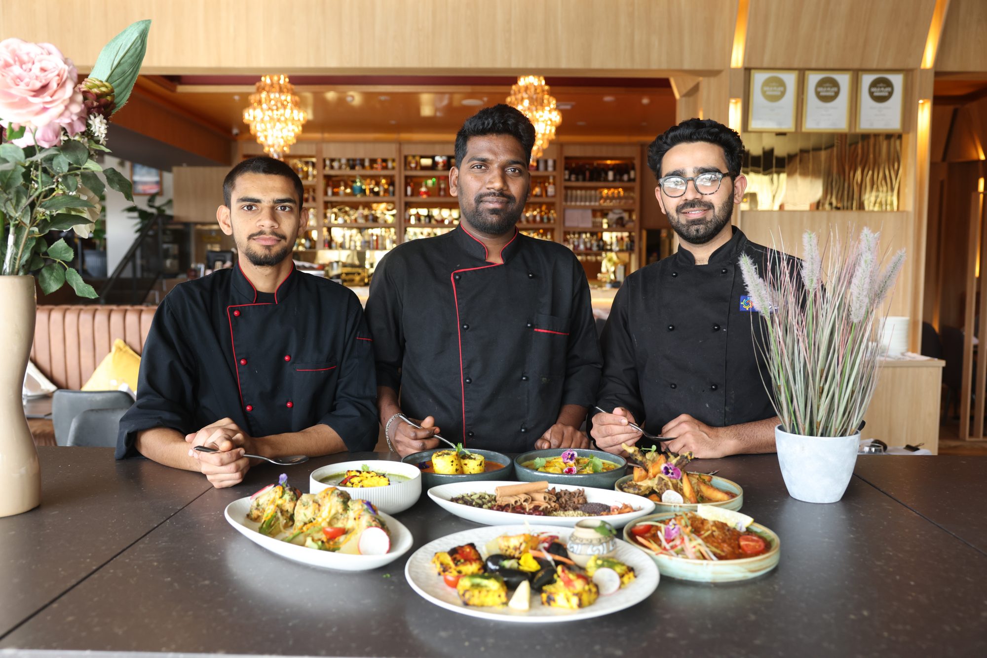 Stonewater culinary team with signature dishes